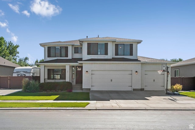 67 N 300 E, Vineyard, UT 84059 - prairie-style house featuring a garage and concrete driveway