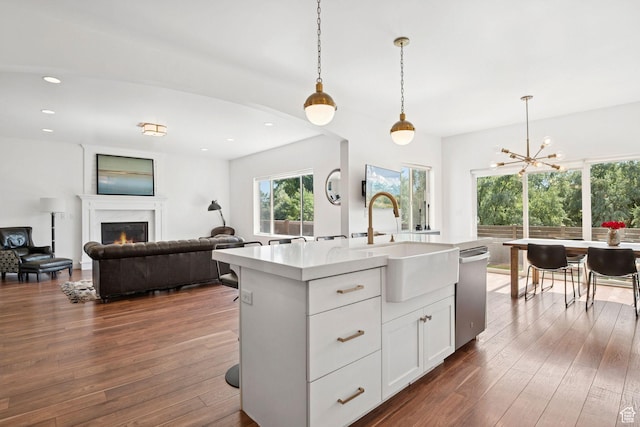 67 N 300 E, Vineyard, UT 84059 - kitchen with dishwasher, light countertops, open floor plan, hanging light fixtures, and recessed lighting