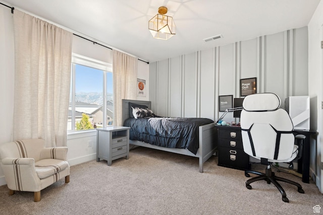 67 N 300 E, Vineyard, UT 84059 - bedroom with carpet, a decorative wall, and an office area