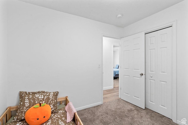 2144 E Easter Dr, Eagle Mountain, UT 84005 - rec room with light carpet and baseboards