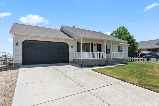 2144 E Easter Dr, Eagle Mountain, UT 84005 - single story home with covered porch, an attached garage, and driveway