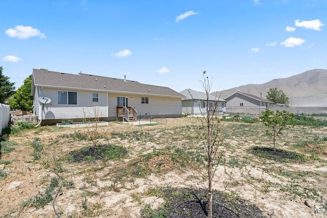 2144 E Easter Dr, Eagle Mountain, UT 84005 - back of house with a mountain view