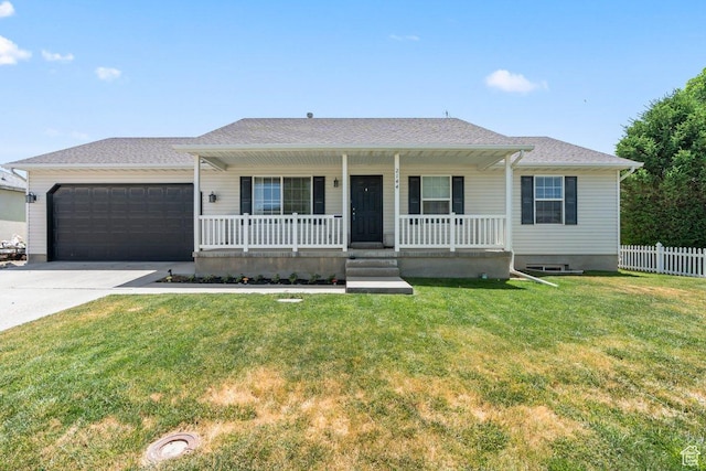 2144 E Easter Dr, Eagle Mountain, UT 84005 - ranch-style house with covered porch, an attached garage, and driveway