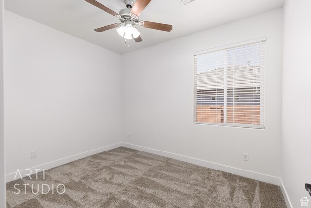 943 N 100 W, Hurricane, UT 84737 - spare room featuring carpet flooring and a ceiling fan