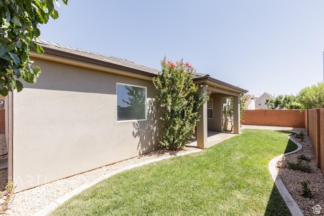 943 N 100 W, Hurricane, UT 84737 - fenced backyard with a patio area