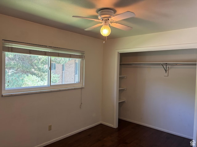 332 W Amiron Way Unit D, Orem, UT 84057 - unfurnished bedroom featuring dark wood-type flooring, a closet, and a ceiling fan