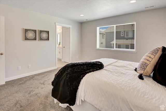 12232 S Sigmon Ln, Herriman, UT 84096 - carpeted bedroom with recessed lighting and connected bathroom