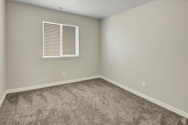 12232 S Sigmon Ln, Herriman, UT 84096 - carpeted spare room featuring baseboards