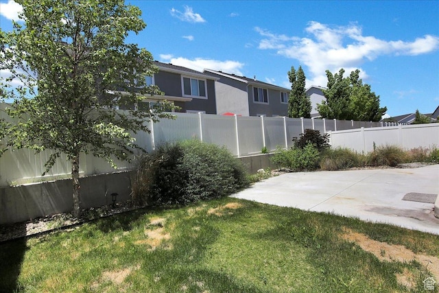 12232 S Sigmon Ln, Herriman, UT 84096 - fenced backyard featuring a patio and a residential view