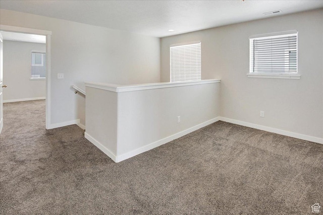 12232 S Sigmon Ln, Herriman, UT 84096 - spare room featuring carpet floors and plenty of natural light
