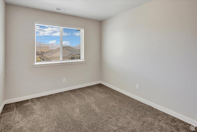 12232 S Sigmon Ln, Herriman, UT 84096 - unfurnished room with dark colored carpet and baseboards