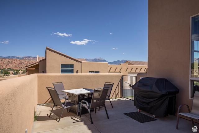 3686 S Spanish Valley Dr Unit Y1, Moab, UT 84532 - patio / terrace with a mountain view, grilling area, and outdoor dining space