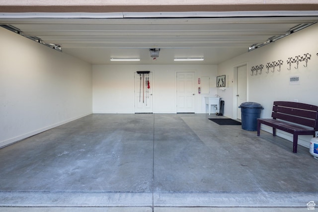3686 S Spanish Valley Dr Unit Y1, Moab, UT 84532 - garage featuring baseboards and a sink