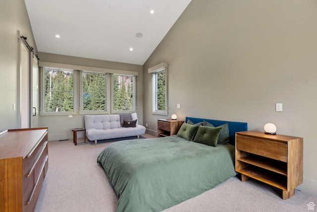 2475 W White Pine Ln Unit 11, Park City, UT 84060 - carpeted bedroom with recessed lighting, a barn door, and high vaulted ceiling