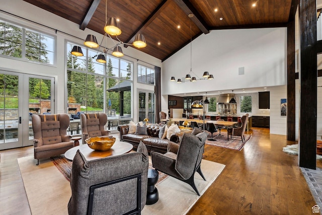 2475 W White Pine Ln Unit 11, Park City, UT 84060 - living room featuring high vaulted ceiling, a wood ceiling with exposed beams, wood finished floors, and french doors