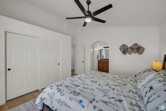 504 E Telegraph St Unit 89, Washington, UT 84780 - bedroom with vaulted ceiling, wood finished floors, a closet, arched walkways, and a ceiling fan