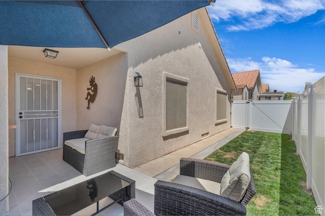 504 E Telegraph St Unit 89, Washington, UT 84780 - fenced backyard with a patio, a gate, and an outdoor hangout area