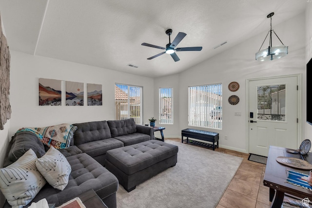 504 E Telegraph St Unit 89, Washington, UT 84780 - living area featuring vaulted ceiling, a ceiling fan, light tile patterned flooring, and a textured ceiling