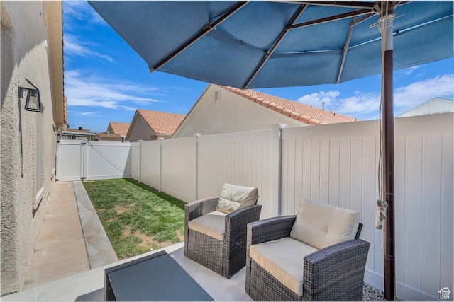 504 E Telegraph St Unit 89, Washington, UT 84780 - fenced backyard with a gate and a patio
