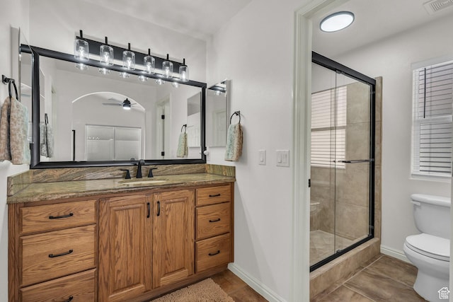 504 E Telegraph St Unit 89, Washington, UT 84780 - full bath featuring a ceiling fan, a shower stall, vanity, and tile patterned floors