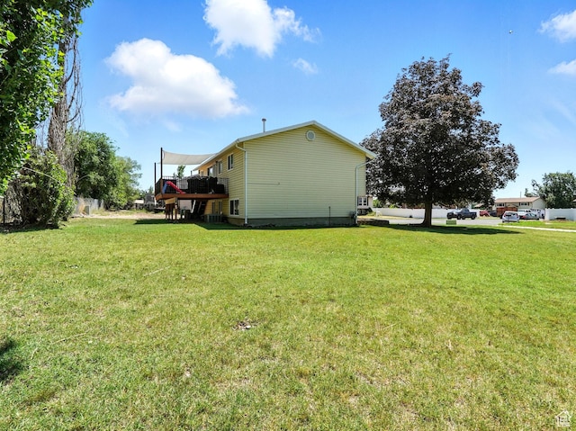 2802 W 4875 S, Roy, UT 84067 - view of side of home with a yard and a wooden deck