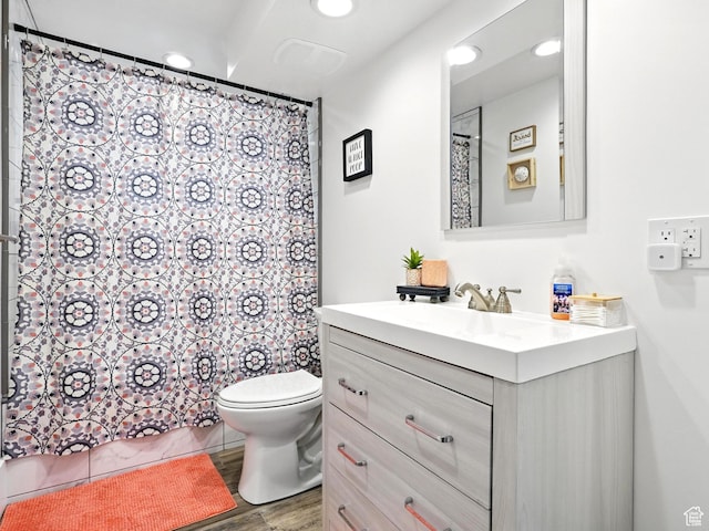 2802 W 4875 S, Roy, UT 84067 - full bathroom with vanity, wood finished floors, recessed lighting, and curtained shower