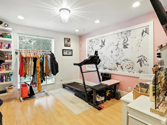 2802 W 4875 S, Roy, UT 84067 - workout room featuring wood finished floors, plenty of natural light, and recessed lighting
