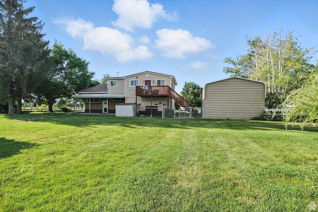 3074 W 3200 N, Benson, UT 84335 - rear view of property with a shed, stairs, a lawn, and a wooden deck