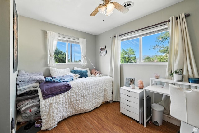3074 W 3200 N, Benson, UT 84335 - bedroom with wood finished floors and ceiling fan