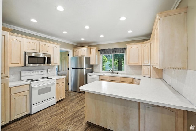 3074 W 3200 N, Benson, UT 84335 - kitchen with appliances with stainless steel finishes, light brown cabinetry, ornamental molding, a peninsula, and recessed lighting