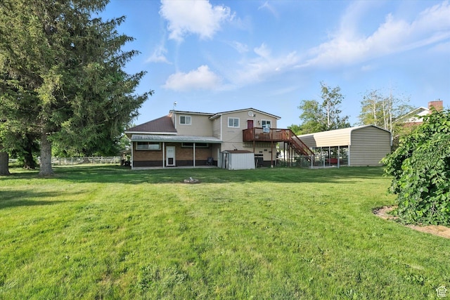 3074 W 3200 N, Benson, UT 84335 - back of property featuring a storage unit, stairs, and a wooden deck