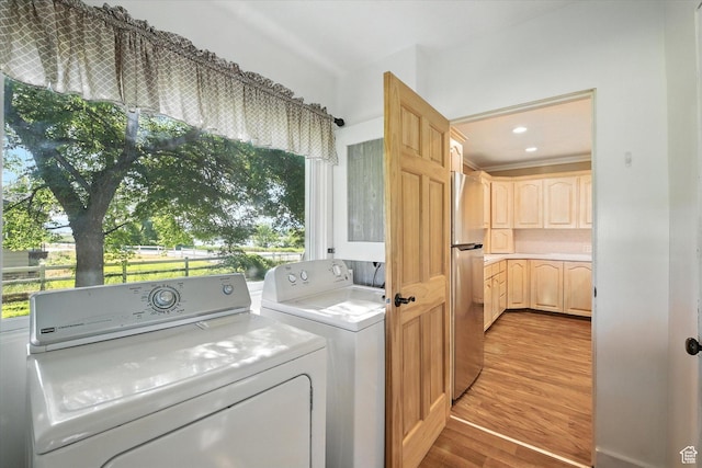 3074 W 3200 N, Benson, UT 84335 - washroom featuring light wood-type flooring and independent washer and dryer