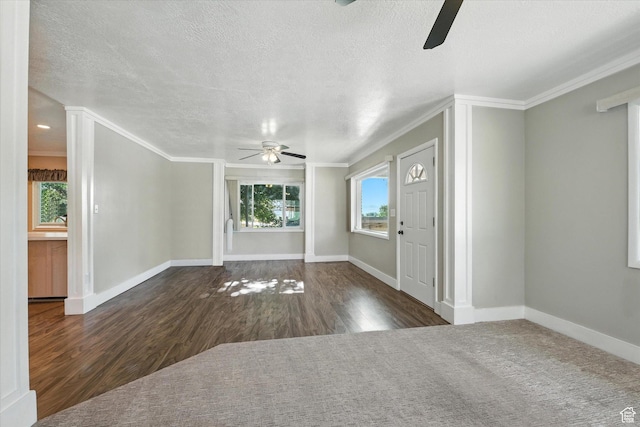 3074 W 3200 N, Benson, UT 84335 - entryway featuring ceiling fan, crown molding, wood finished floors, and a textured ceiling