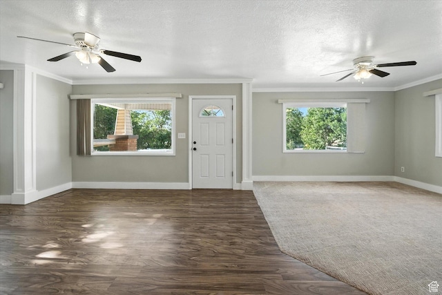 3074 W 3200 N, Benson, UT 84335 - foyer entrance with a ceiling fan, ornamental molding, wood finished floors, and a textured ceiling
