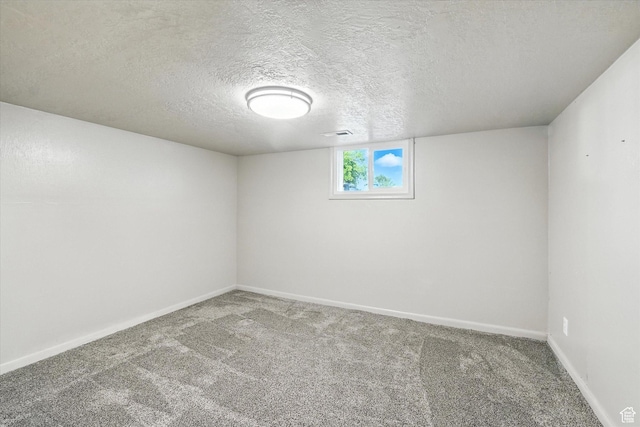 3074 W 3200 N, Benson, UT 84335 - carpeted empty room with baseboards and a textured ceiling