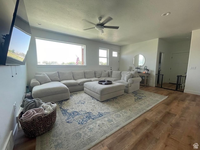 225 W 400 S, Ephraim, UT 84627 - living area featuring ceiling fan, wood finished floors, and a textured ceiling