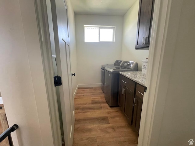 225 W 400 S, Ephraim, UT 84627 - laundry area with cabinet space, washing machine and clothes dryer, and light wood-type flooring