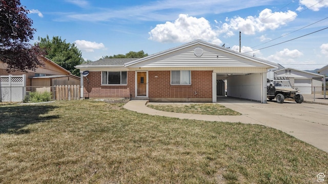 1254 Marilyn Dr, Layton, UT 84041 - ranch-style house featuring an attached carport, brick siding, and concrete driveway