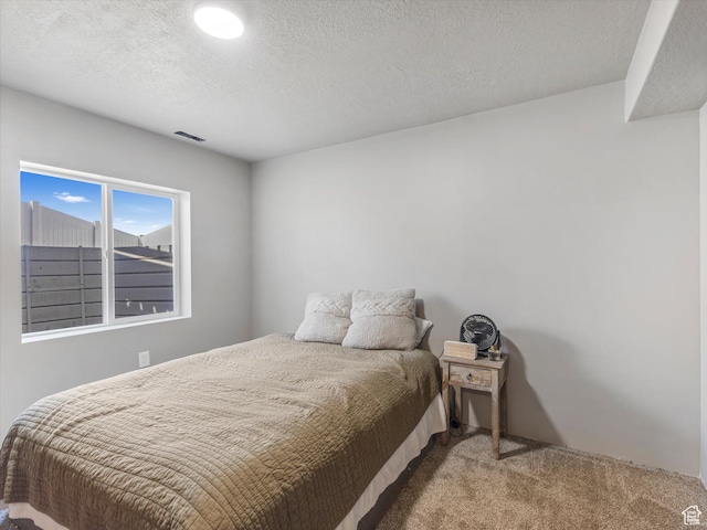 406 W Tesla Ct, Grantsville, UT 84029 - carpeted bedroom featuring a textured ceiling
