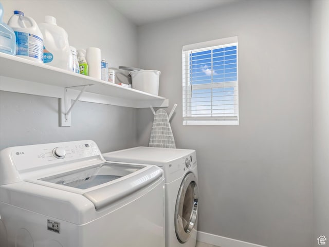 406 W Tesla Ct, Grantsville, UT 84029 - washroom with separate washer and dryer and baseboards