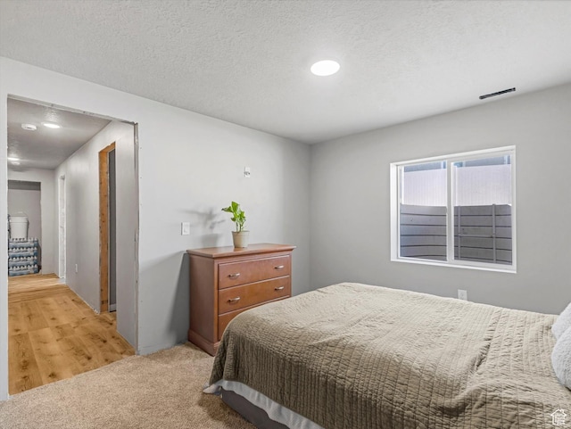 406 W Tesla Ct, Grantsville, UT 84029 - bedroom featuring light carpet