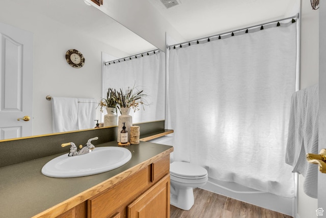 1156 E Avalon Hills Dr N, Ogden, UT 84404 - bathroom featuring vanity, wood finished floors, and shower / bath combination with curtain