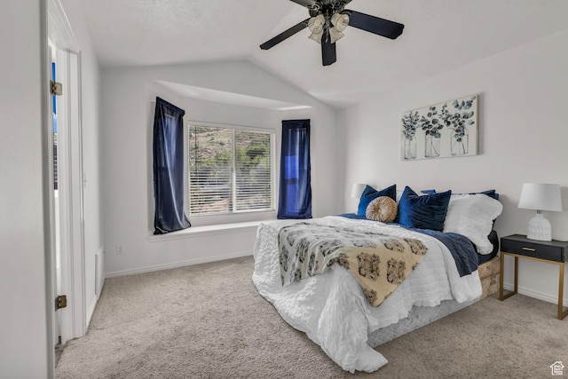 1156 E Avalon Hills Dr N, Ogden, UT 84404 - bedroom with vaulted ceiling, carpet, and a ceiling fan