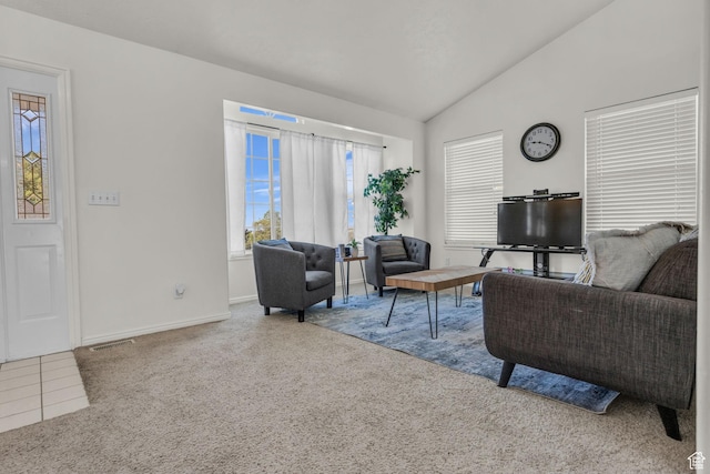 1156 E Avalon Hills Dr N, Ogden, UT 84404 - carpeted living area featuring lofted ceiling and baseboards