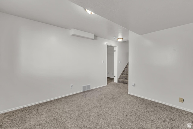1156 E Avalon Hills Dr N, Ogden, UT 84404 - carpeted spare room with stairs and baseboards