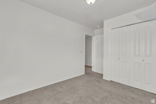 1156 E Avalon Hills Dr N, Ogden, UT 84404 - unfurnished bedroom featuring carpet flooring and a closet