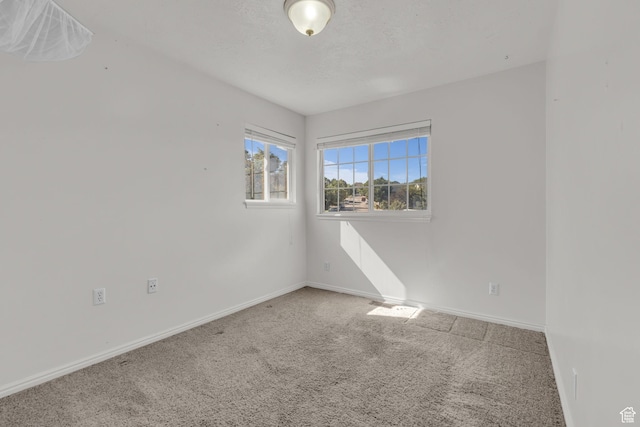 1156 E Avalon Hills Dr N, Ogden, UT 84404 - carpeted spare room with baseboards