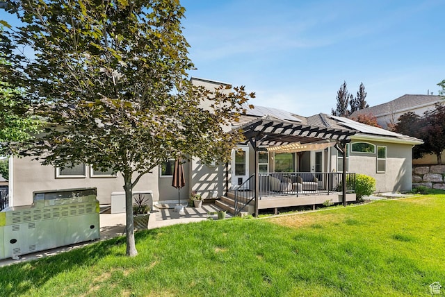 1036 E Fairway Dr, North Salt Lake, UT 84054 - back of property featuring a pergola, stucco siding, a lawn, a deck, and solar panels
