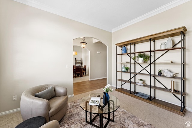 1036 E Fairway Dr, North Salt Lake, UT 84054 - living area featuring arched walkways, ornamental molding, and carpet