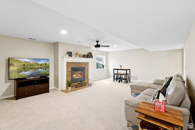 1036 E Fairway Dr, North Salt Lake, UT 84054 - carpeted living room with ceiling fan, a tiled fireplace, and recessed lighting